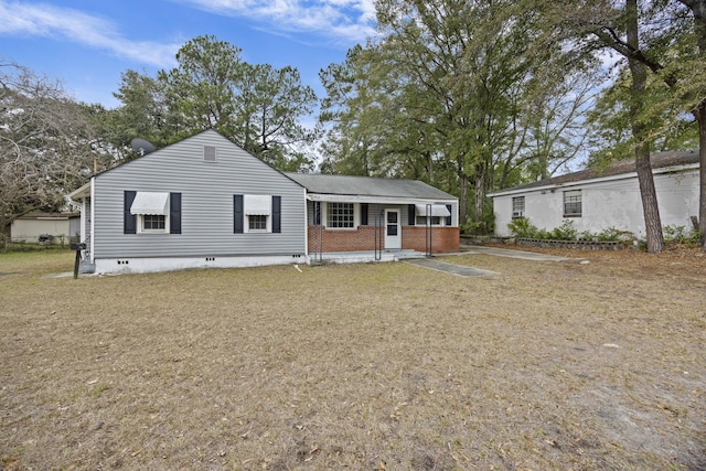 2736 Bonds Ave, North Charleston, SC 29405 - rear view of house with a lawn