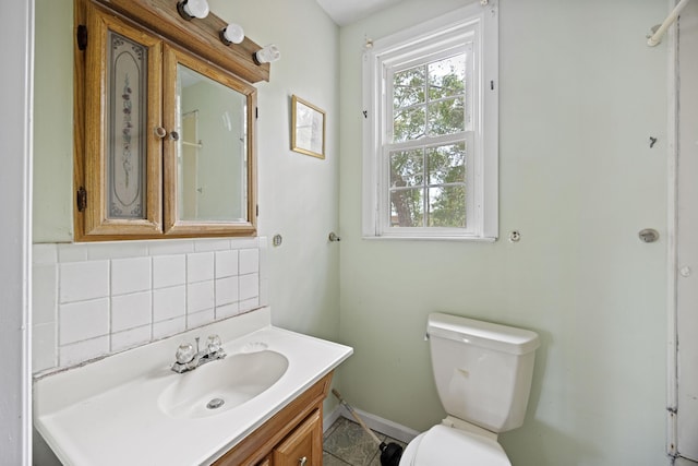 2736 Bonds Ave, North Charleston, SC 29405 - bathroom with decorative backsplash, toilet, and vanity