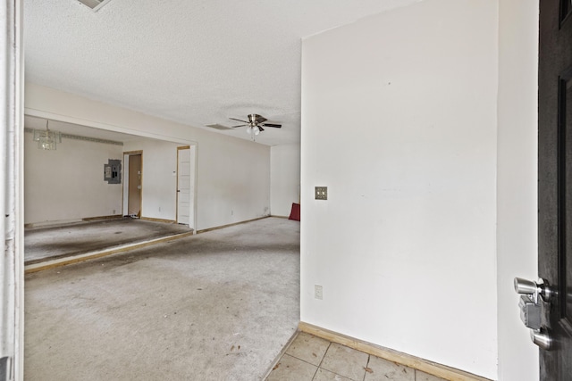 2736 Bonds Ave, North Charleston, SC 29405 - tiled spare room featuring ceiling fan, a textured ceiling, and electric panel