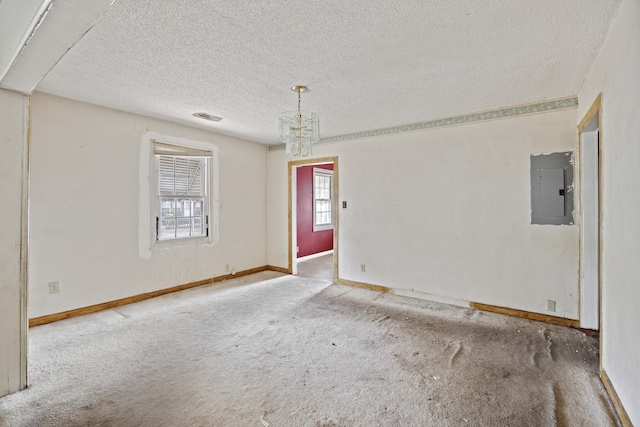 2736 Bonds Ave, North Charleston, SC 29405 - carpeted empty room with a textured ceiling and electric panel