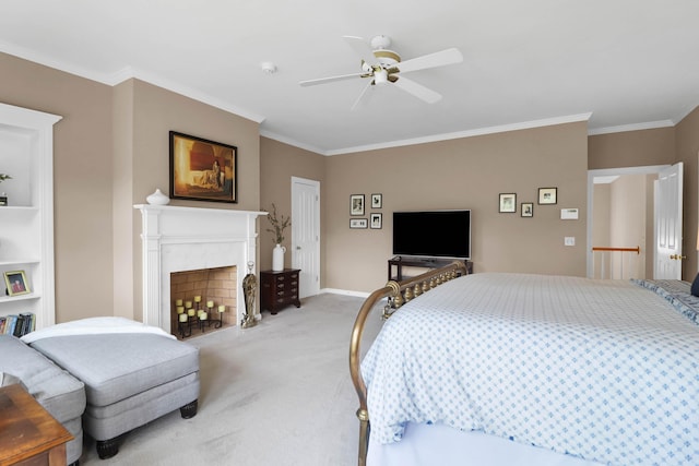 bedroom featuring a fireplace, baseboards, light colored carpet, ceiling fan, and ornamental molding