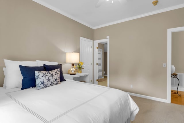 bedroom with carpet flooring, a ceiling fan, ornamental molding, and baseboards