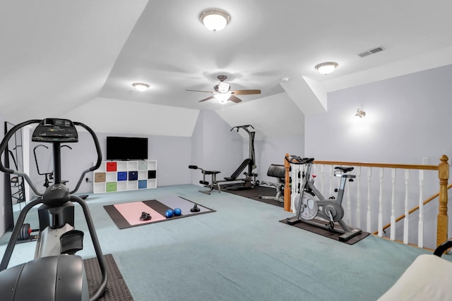 workout room featuring carpet flooring, a ceiling fan, lofted ceiling, and visible vents