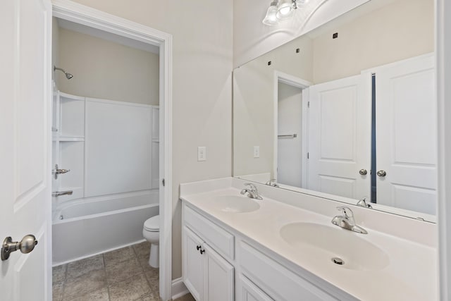 full bathroom featuring vanity, shower / bath combination, and toilet