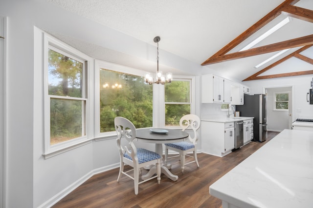 dining space with a chandelier, lofted ceiling with beams, dark hardwood / wood-style floors, and a healthy amount of sunlight