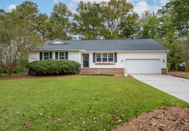 single story home featuring a front yard and a garage