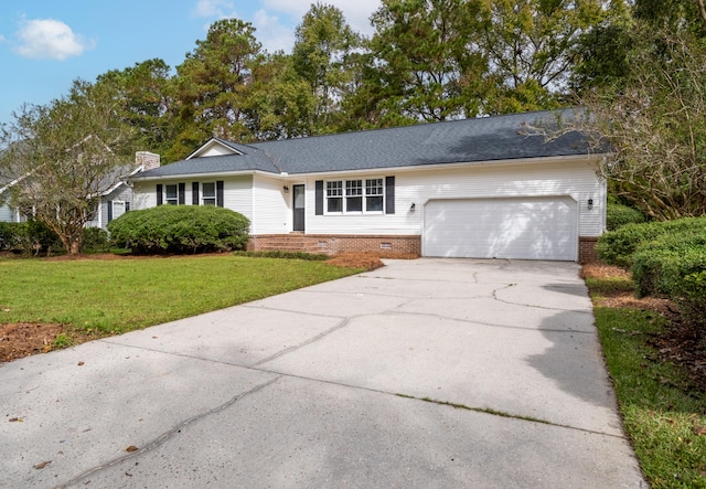 single story home with a garage and a front lawn