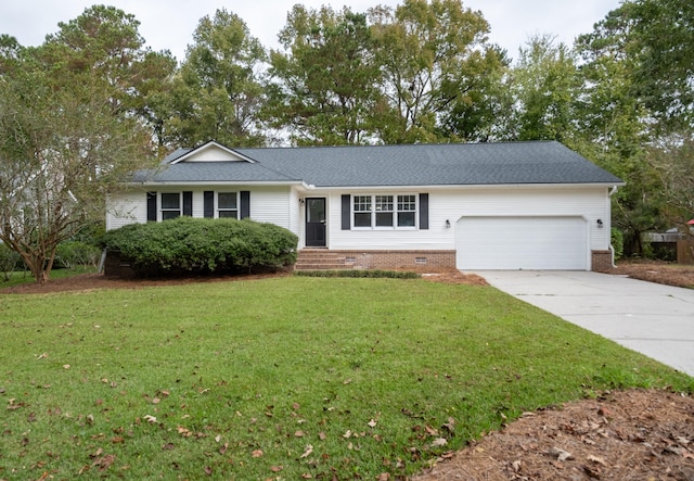 ranch-style home with a garage and a front lawn