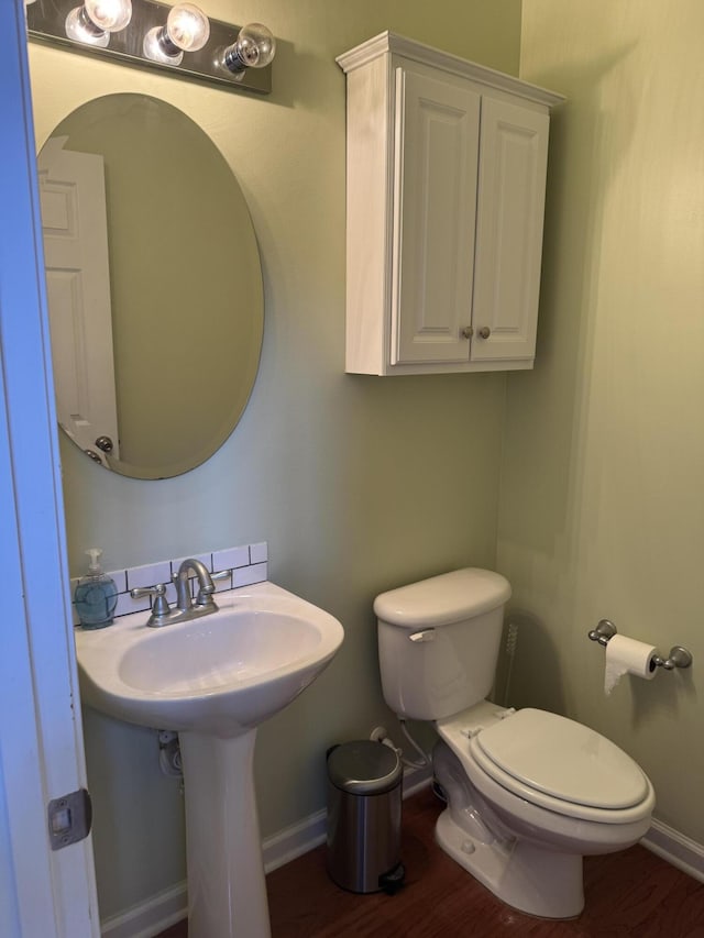 101 Cobblers Glen Ct, Lexington, SC 29072 - half bathroom featuring baseboards, toilet, and wood finished floors