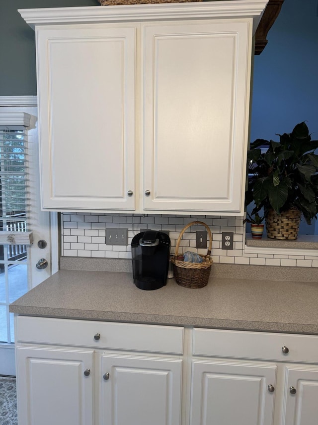 101 Cobblers Glen Ct, Lexington, SC 29072 - room details featuring white cabinets and tasteful backsplash