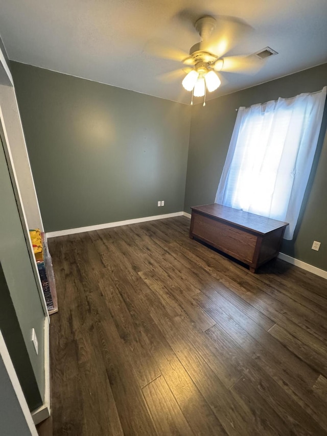 101 Cobblers Glen Ct, Lexington, SC 29072 - unfurnished bedroom with baseboards, a ceiling fan, dark wood finished floors, and visible vents