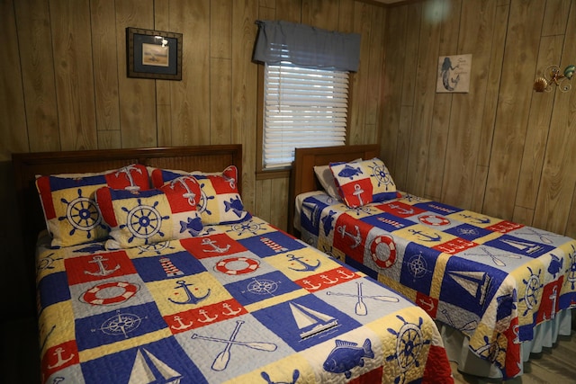 bedroom with wooden walls