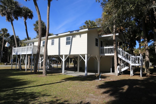 back of property featuring a lawn