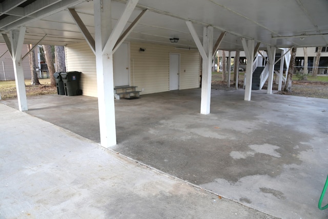 exterior space with a carport