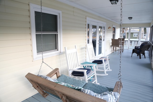 wooden terrace with covered porch