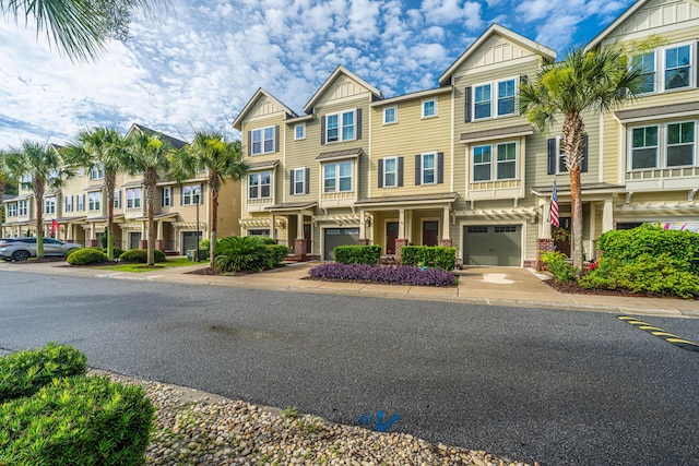 1253 Dingle Rd, Mount Pleasant, SC 29466 - view of property with board and batten siding and a residential view