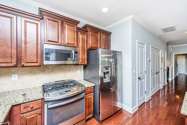 1253 Dingle Rd, Mount Pleasant, SC 29466 - kitchen featuring stainless steel appliances, wood finished floors, light stone countertops, ornamental molding, and tasteful backsplash