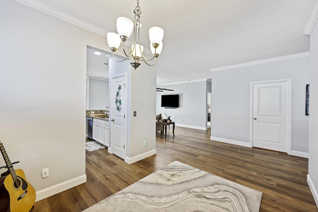 dining space featuring a chandelier, dark hardwood / wood-style floors, and ornamental molding