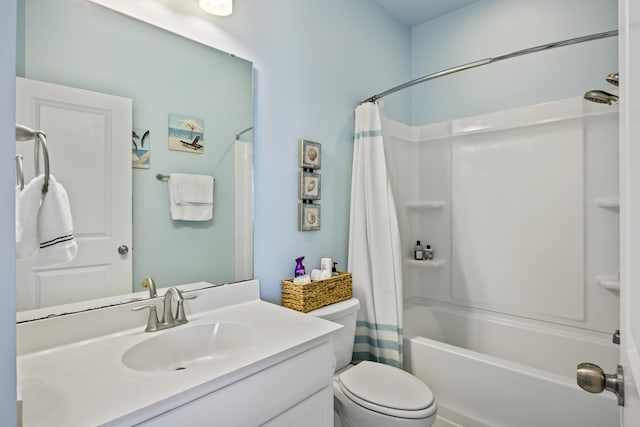 full bathroom featuring vanity, shower / bathtub combination with curtain, and toilet