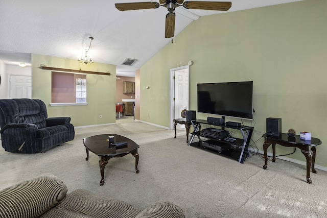 carpeted living room featuring vaulted ceiling and ceiling fan