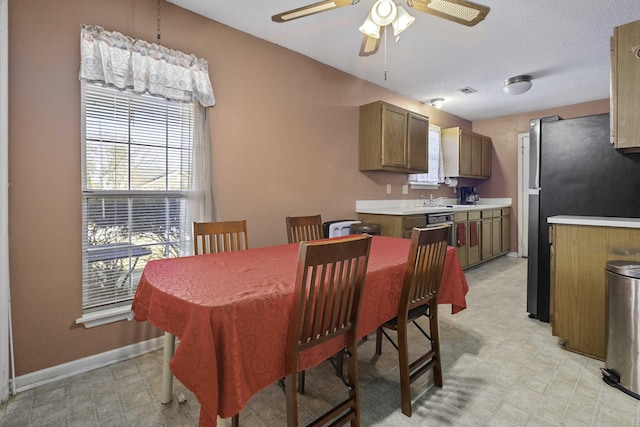 dining area featuring ceiling fan