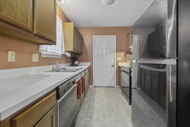 kitchen featuring sink, a textured ceiling, and black appliances