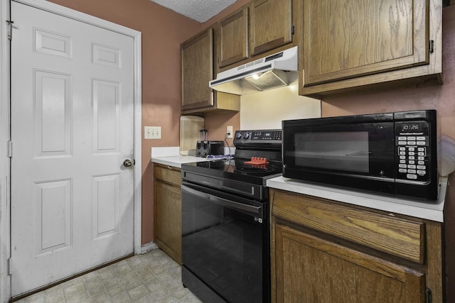 kitchen with black appliances