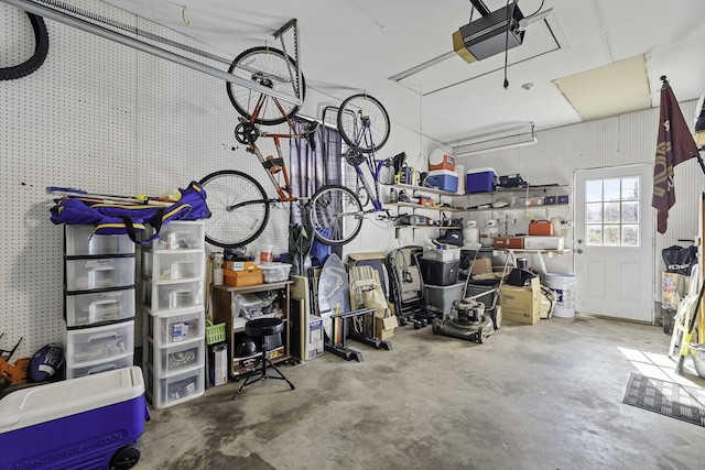 garage featuring a garage door opener