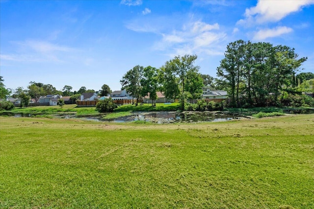 view of yard with a water view