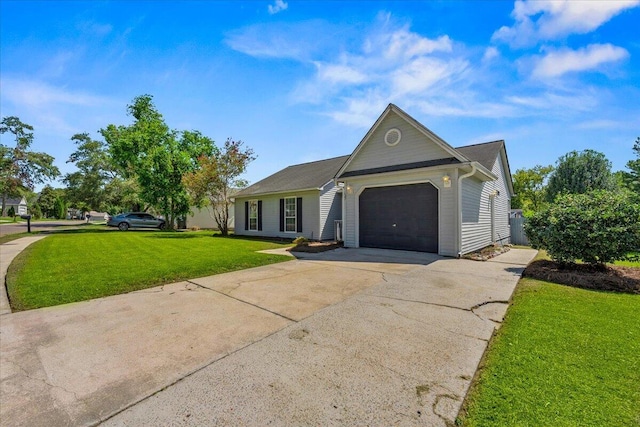 single story home with driveway, a garage, and a front lawn