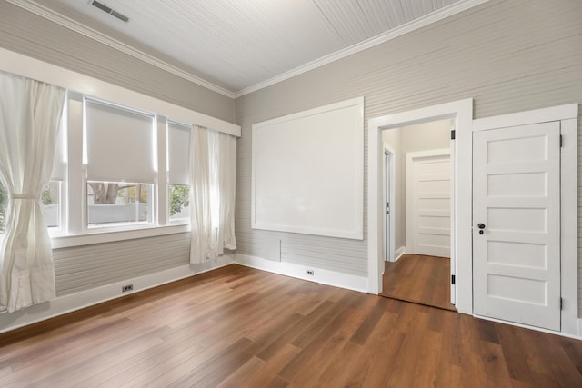 222 E Main St, Moncks Corner, SC 29461 - spare room with ornamental molding, dark wood finished floors, and baseboards
