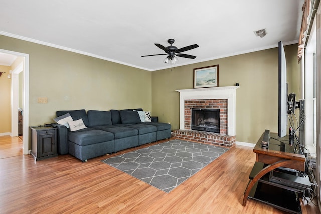 103 Retriever Ln, Goose Creek, SC 29445 - living room with a ceiling fan, wood finished floors, crown molding, a fireplace, and baseboards