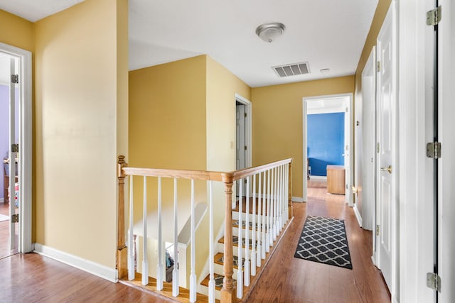 103 Retriever Ln, Goose Creek, SC 29445 - corridor with an upstairs landing, wood finished floors, and baseboards