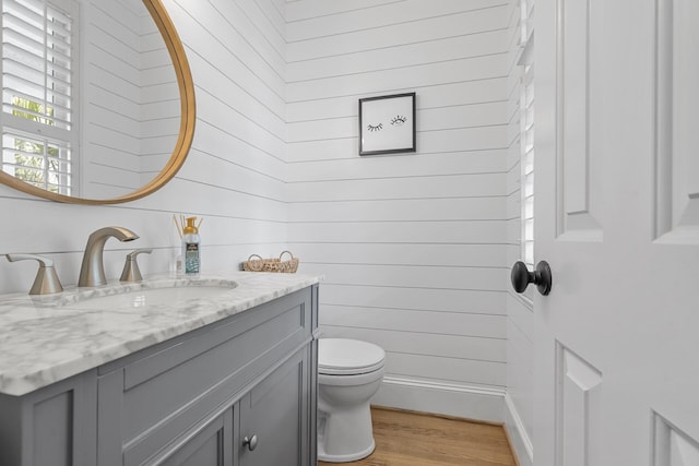 228 Beresford Creek St, Charleston, SC 29492 - bathroom featuring vanity, wood finished floors, and wood walls