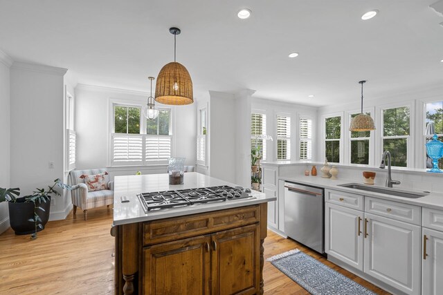 228 Beresford Creek St, Charleston, SC 29492 - kitchen featuring stainless steel appliances, light countertops, white cabinetry, light wood-type flooring, and recessed lighting