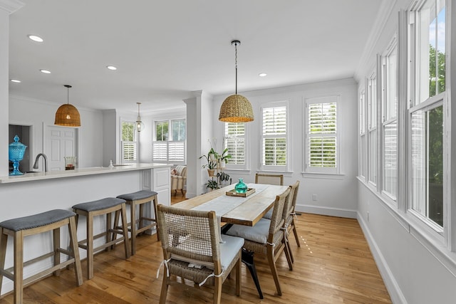 228 Beresford Creek St, Charleston, SC 29492 - dining area featuring light wood-style floors, crown molding, and recessed lighting