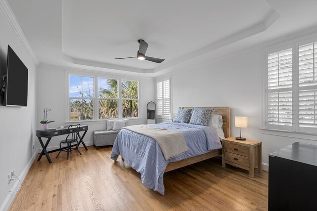 228 Beresford Creek St, Charleston, SC 29492 - bedroom featuring a raised ceiling, wood finished floors, and a ceiling fan