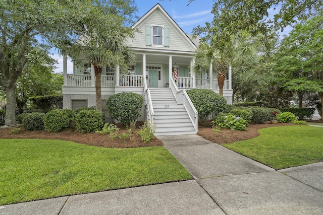 228 Beresford Creek St, Charleston, SC 29492 - view of front of home featuring stairs, covered porch, and a front yard