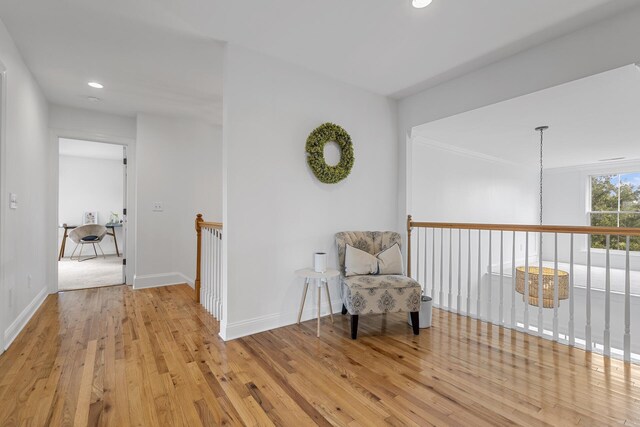228 Beresford Creek St, Charleston, SC 29492 - living area featuring light wood finished floors, an upstairs landing, and recessed lighting