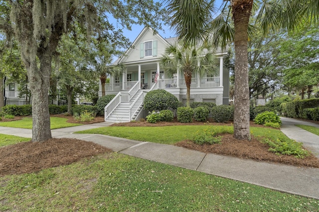 228 Beresford Creek St, Charleston, SC 29492 - view of front of home with a porch, a front yard, and stairway