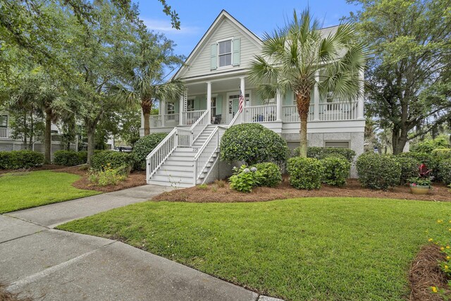 228 Beresford Creek St, Charleston, SC 29492 - coastal home with a porch, stairway, and a front yard
