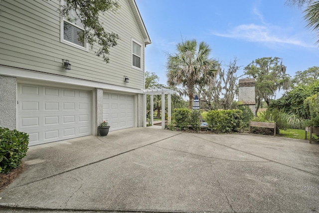 228 Beresford Creek St, Charleston, SC 29492 - view of home's exterior featuring concrete driveway, a garage, and a pergola