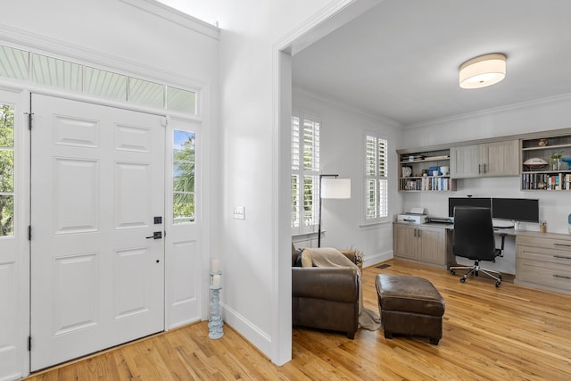 228 Beresford Creek St, Charleston, SC 29492 - entryway featuring light wood-style floors, built in desk, and crown molding