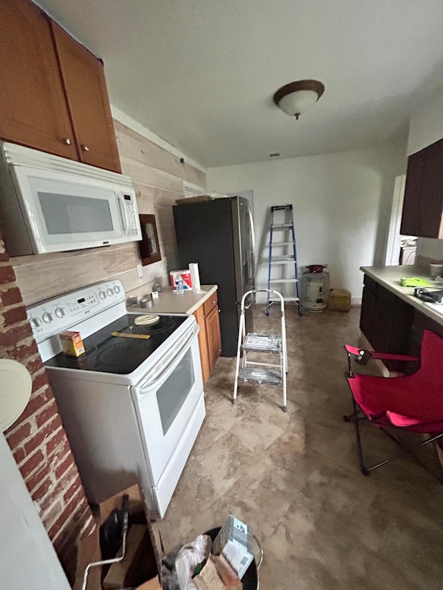 kitchen with white appliances and sink