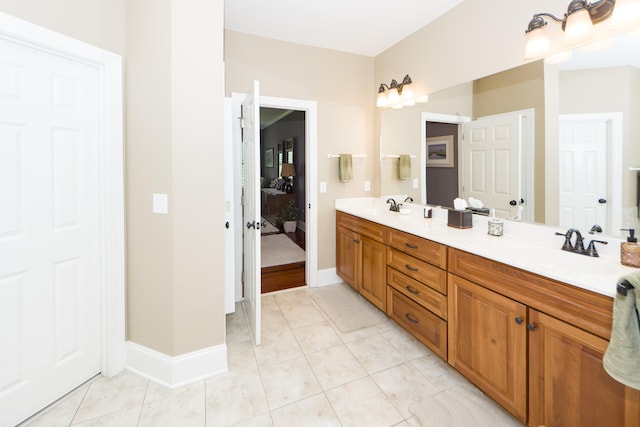 bathroom with vanity and tile patterned flooring