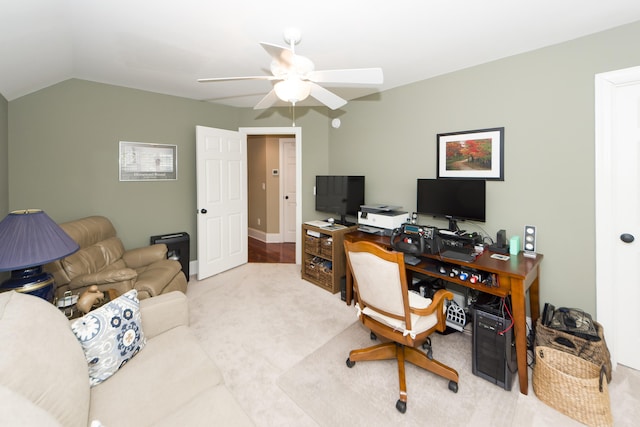 office featuring ceiling fan, carpet flooring, and lofted ceiling