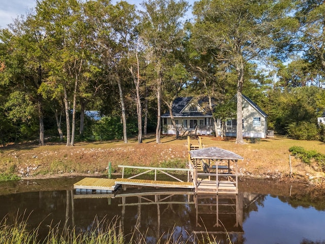 view of dock with a water view