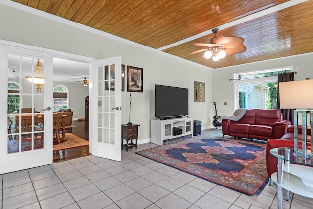 2494 Cape Rd, Johns Island, SC 29455 - tiled living room with a ceiling fan, french doors, wooden ceiling, plenty of natural light, and crown molding