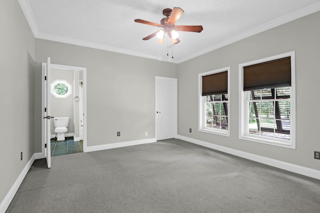 2494 Cape Rd, Johns Island, SC 29455 - unfurnished bedroom with carpet floors, ornamental molding, ensuite bathroom, and ceiling fan
