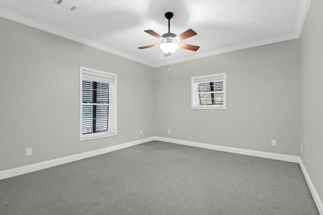 2494 Cape Rd, Johns Island, SC 29455 - empty room featuring dark colored carpet, ceiling fan, a textured ceiling, and ornamental molding